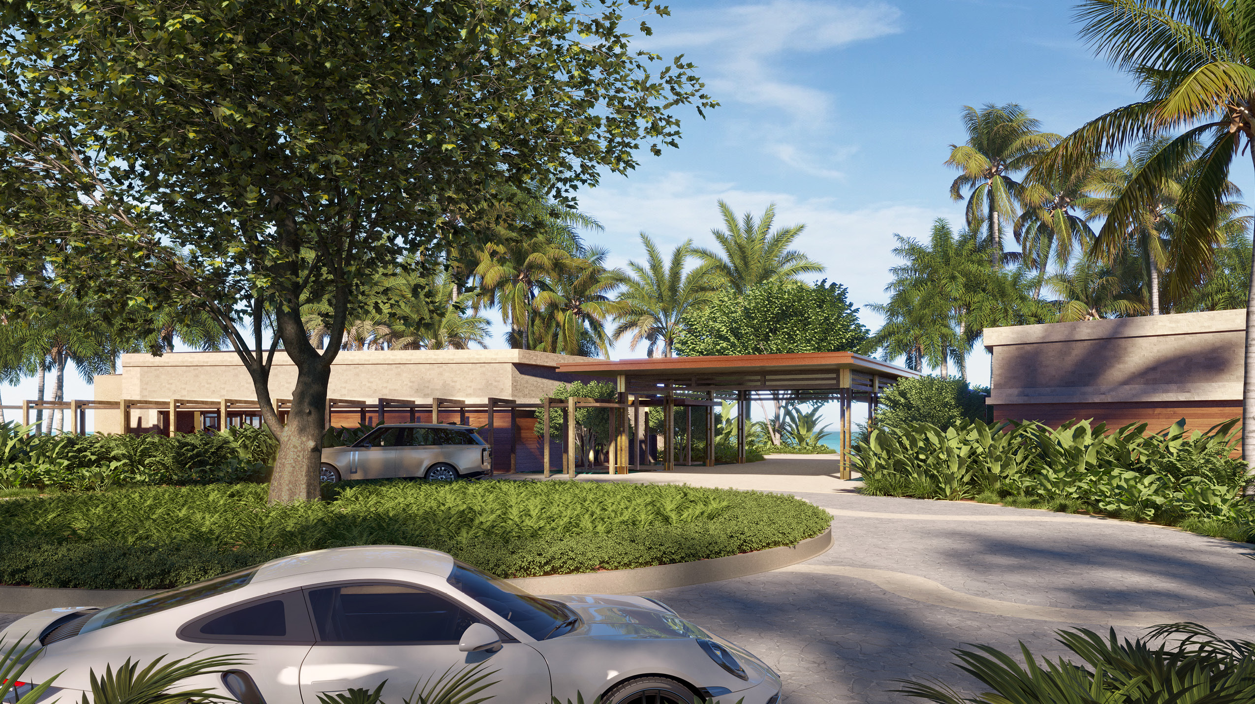 An inviting entrance to a luxury facility at Grand Reserve with lush landscaping and a modern, welcoming design.